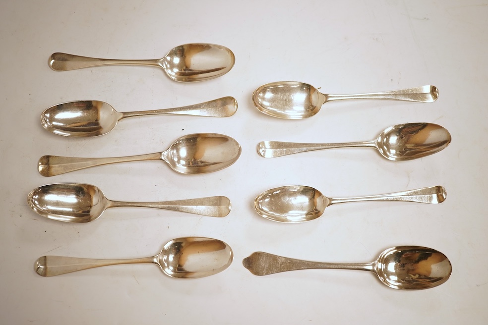 An 18th century Irish? provincial silver Hanoverian pattern tablespoon, maker's mark stamped twice 'I.T with crown above and mullet below' and 'Sterling', 20.9cm, together with eight assorted 18th century silver rat tail